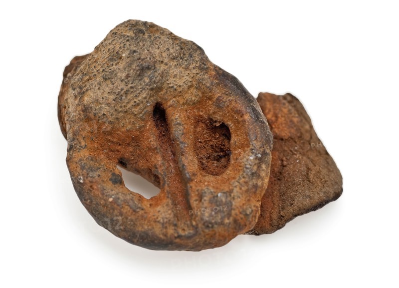 Small shoe buckle with leather fragment, buckle fastener component soil find brass leather metal, archeology Rotterdam City