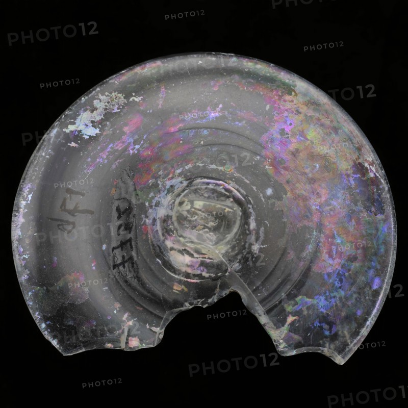 Foot of drinking glass with pontil brand in the soul, drinking glass drinkware tableware holder fragment soil find glass