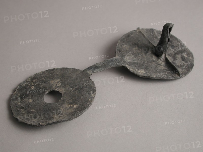 Cloth lead, unused, sheeting quality seal ground find lead metal, Cloth bob unused and thus opened with four circles possible
