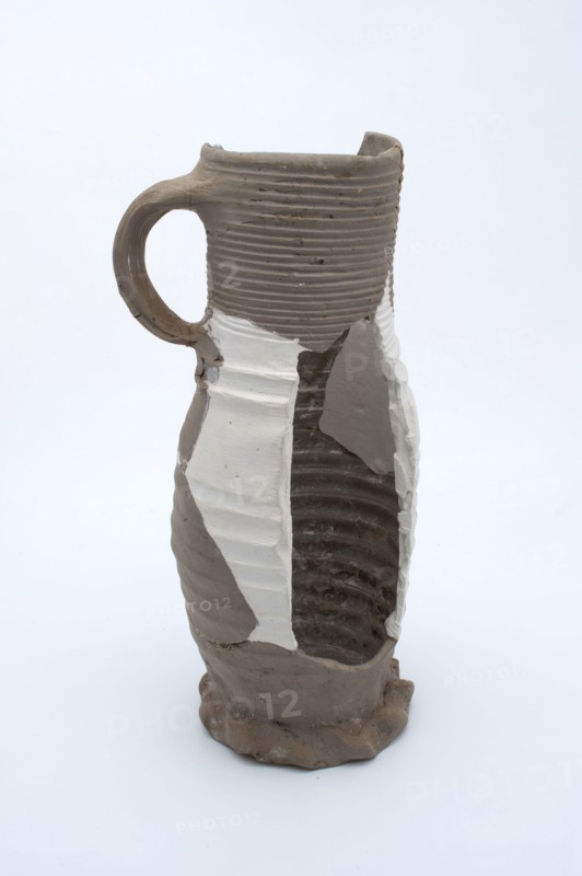 Fragment stoneware with slightly curved body and cylindrical neck, drinking jug jug crockery holder fragment soil found ceramic