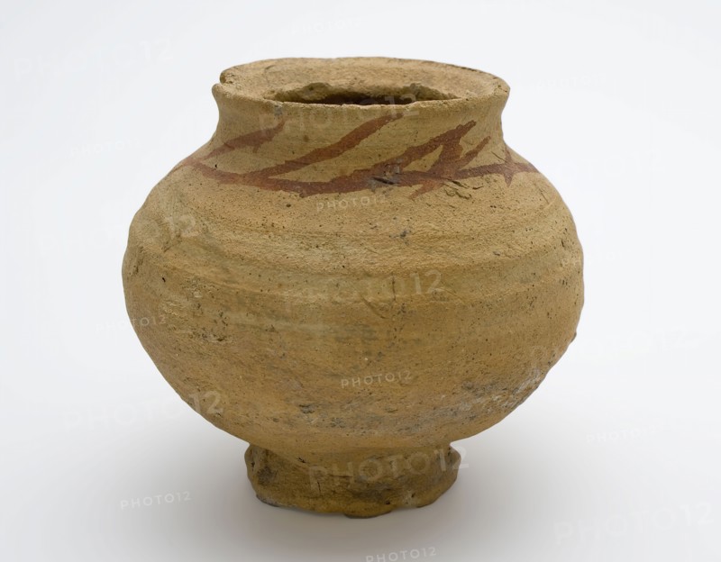 Pingsdorf ball pot on small foot, brown-yellow with streaks of denim paint, ball pot kitchenware earthenware ceramics pottery