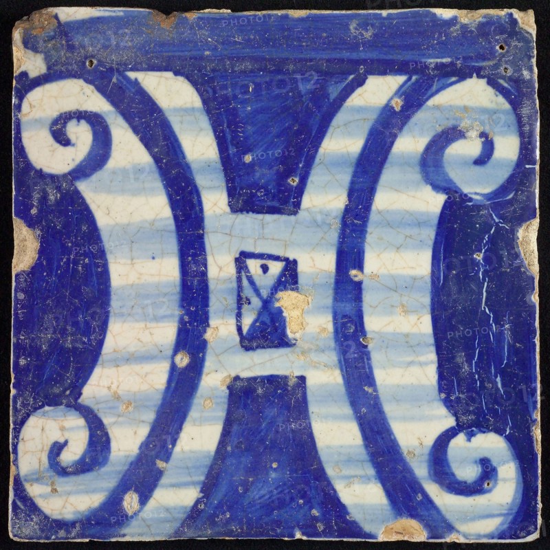 Tile of chimney pilaster, blue on white, part of column with H-shaped curly ornament, chimney pilaster tile pilaster footage