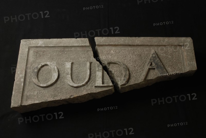 Fragment of facing brick with text OUD, facing brick building part stone 31,5, minced rectangular frame and text in high relief