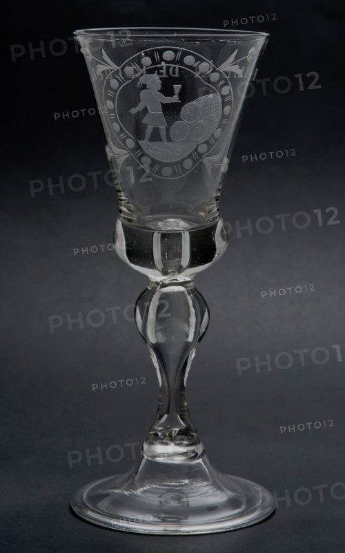 Chalice glass engraved with cartouche, child with glass by pile of barrels and Hansie in the cellar, wineglass drinking glass