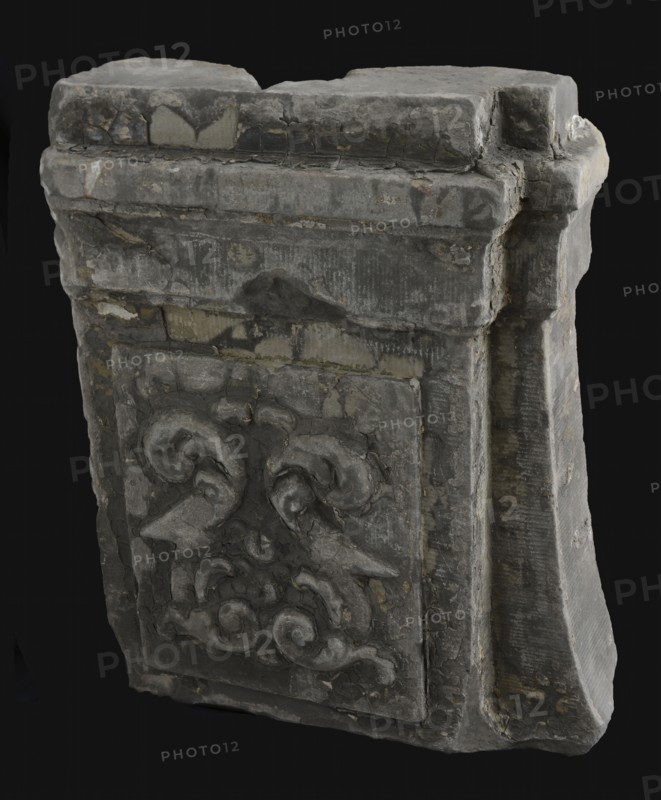 Fragment facade ornament with frame and curls, façade ornament ornament basement building component sandstone stone paint
