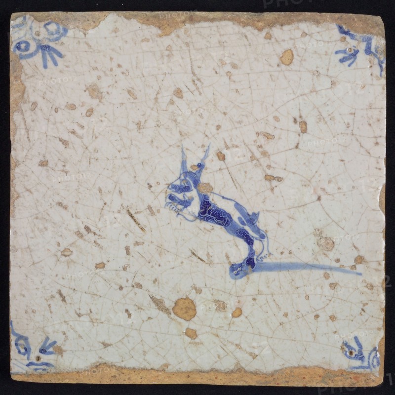 Animal tile with jumping dog, small and blue decor on white ground, corner filler ox head, wall tile tile sculpture ceramic