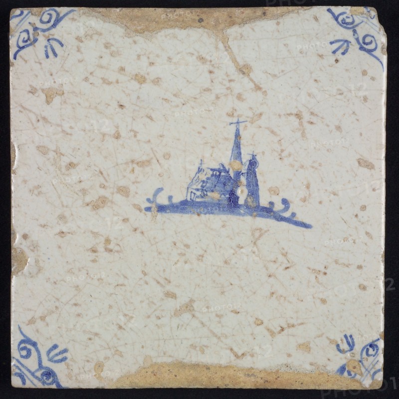 Scene tile, landscape tile with church building, blue decor on white ground, corner filler ox head, wall tile tile sculpture