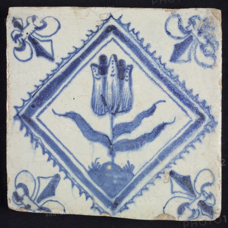 Flower tile with tulip in serrated square, blue decor on white ground, corner filling lily, wall tile tile sculpture ceramic