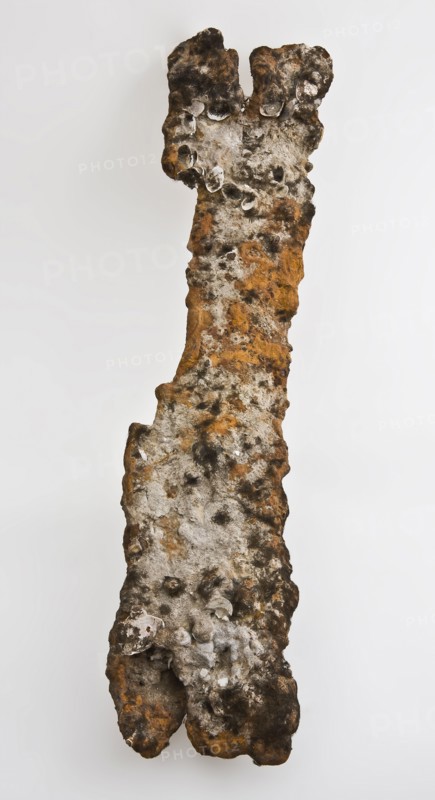 Iron object from Roman times, artifact foundations of iron lime metal, w 13.7 forged Elongated iron object with split ends