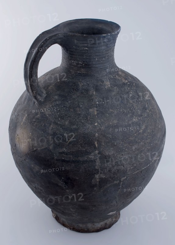 Large dark gray jug on slightly pinched stand ring, tableware holder earthenware ceramic pottery, hand-turned baked Large dark