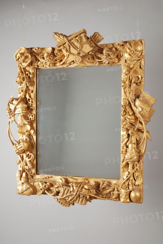 Gilded lime wood mirror in frame with cut toilet attributes, interior mirror glass glass linden wood gold leaf plywood wood