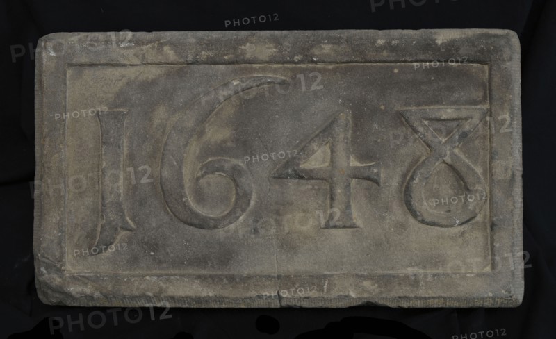 Facing brick with date 1648, facing brick foundation stone building component sandstone stone, minced rectangular frame and year