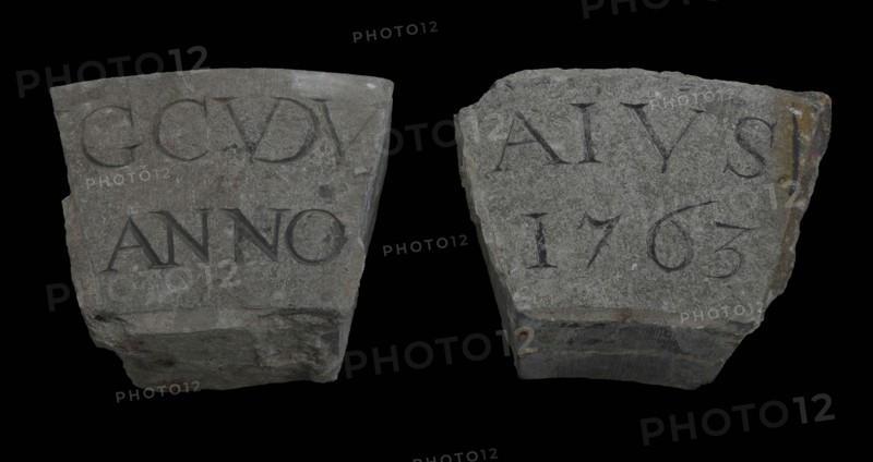 Facing brick in two parts with text GCVDVAIVS ANNO 1763, facing brick foundation stone building component stone, minced