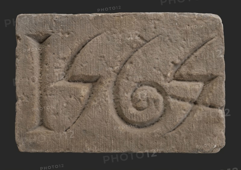 Facade stone with date 1565, Dominican monastery, facing brick foundation stone building component sandstone stone, minced