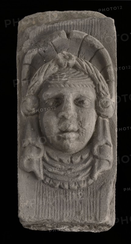 Keystone with gable head, female head with headscarf, keystone gable ornament building component sandstone stone, sculpted Above