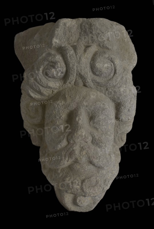 Console with male head, console building element sandstone stone, sculpted Console with male head surrounded by curls