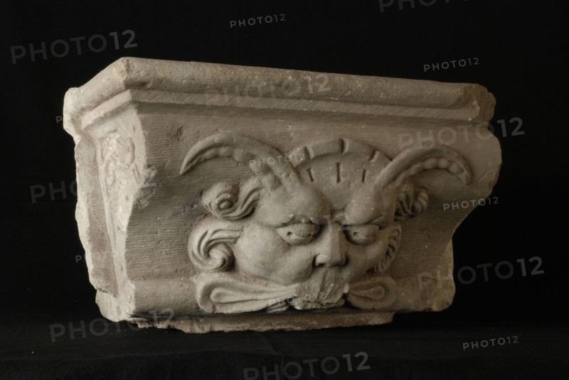 Console with devil's head, console building element sandstone stone, sculpted Top with red ink: (unreadable) 1919 Rotterdam City