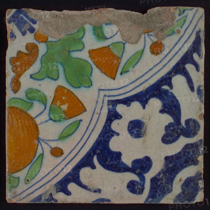 Ornament tile, diagonal ornament in quatrefoil with bows in which orange-apples and flowers, palm corner, corner pattern rosette