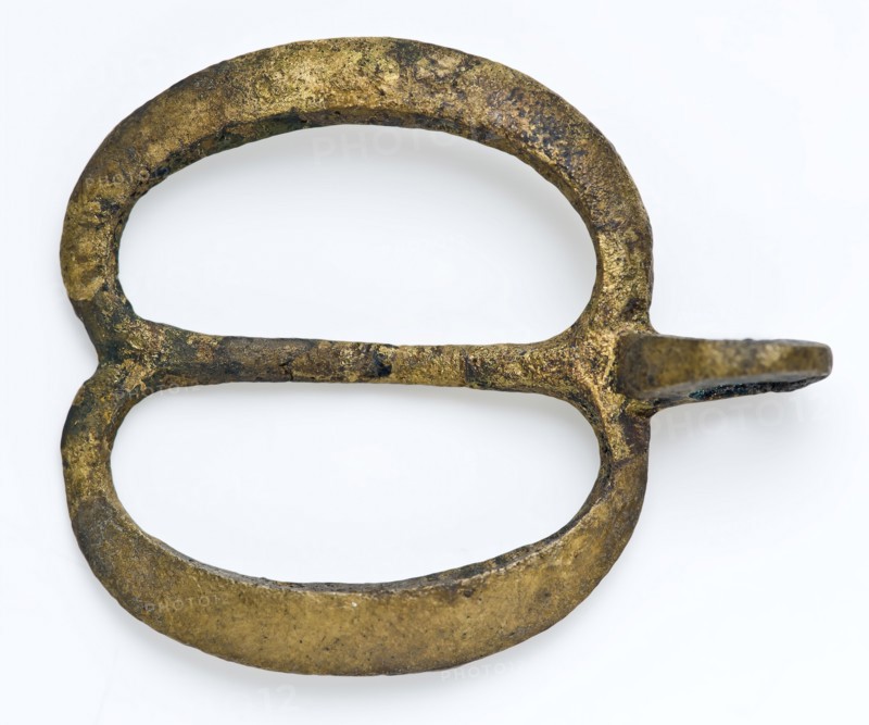 Belt accessory in the form of kinked buckle without sting, including hanging loop, buckle fastener component soil find copper