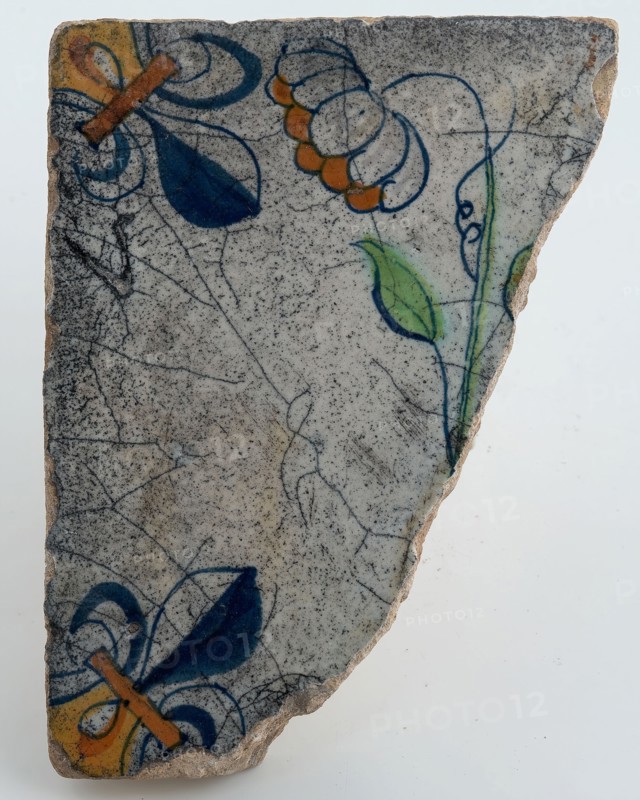 Fragment flower tile with corner decoration and central multi-colored flower arrangement, corner pattern lily, wall tile