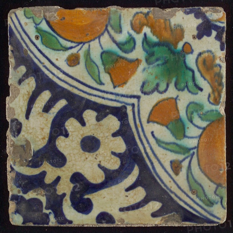 Ornament tile, diagonal ornament in quatrefoil with bows in which orange-apples and flowers, palm corner, corner motif rosette