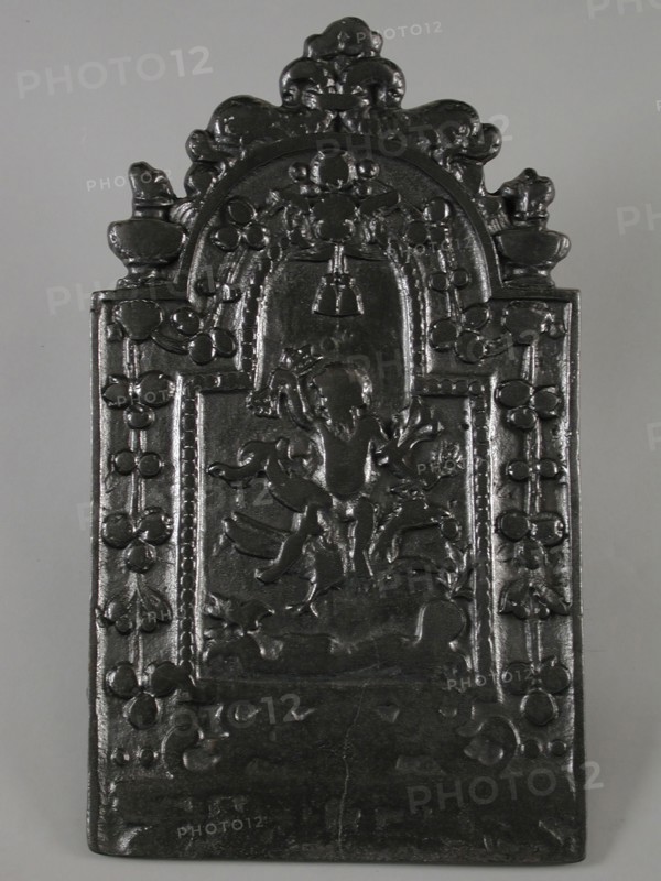 Fireback Jupiter seated on eagle, hob plate cast iron, cast Rectangular with arch Around broad border with flower garlands