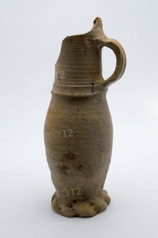 Stoneware jug, Jug or jacobakan, with gray color and orange glow, on squeeze foot, Jug or jacobakan jug crockery holder soil