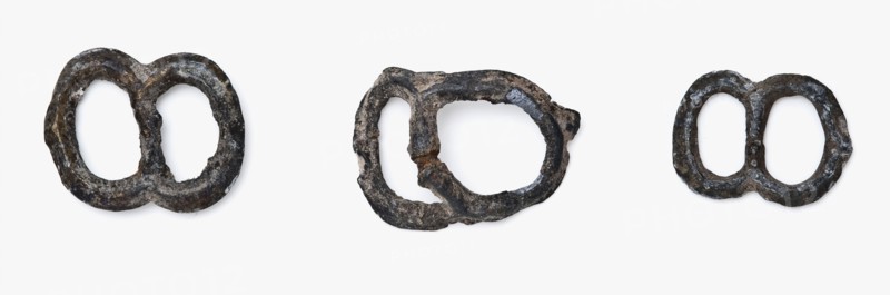 Three pewter ornamental buckles with two oval eyes, clasp fastener component soil find tin metal largest, cast Three pewter