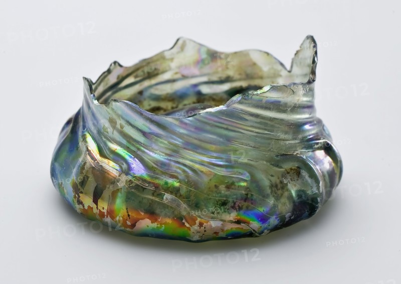 Fragment of foot, bottom and part wall of corrugated cup, drinking glass drinking utensils tableware holder soil find glass