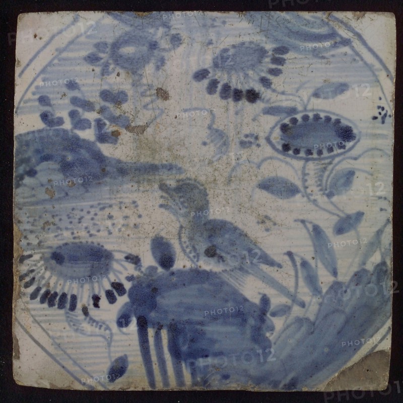 Chinese tile, blue on white, inside circle water with bird and flowers, wall tile tile sculpture ceramic earthenware glaze