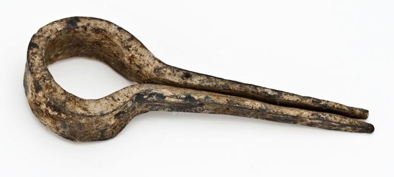 Curved metal flat bar in shape of eye with pins, Mouth-harp musical instrument soundstuff foundations iron metal, archeology
