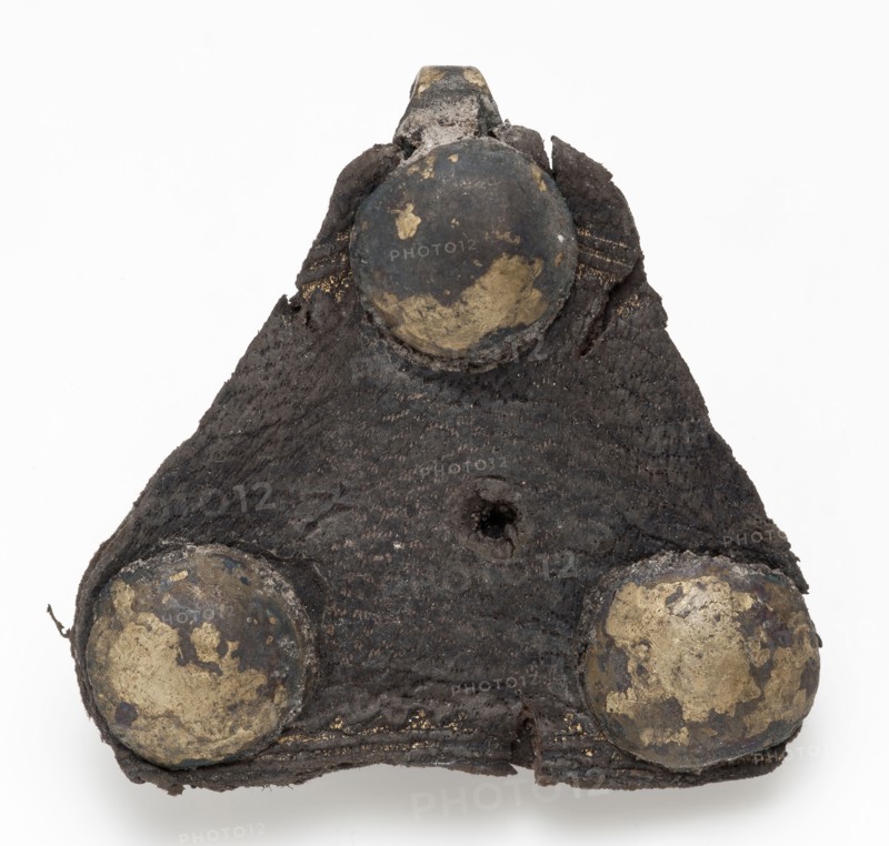 Triangular riveted piece of batter with hook and remnant leather, fitting closure soil finding brass leather metal, whipped