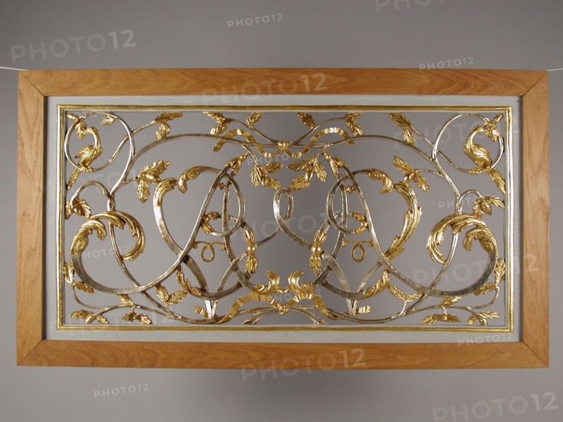 Headlight with cut monogram in the middle of tendrils with leaves, in new frame, cutting frame surface light carvings sculpture
