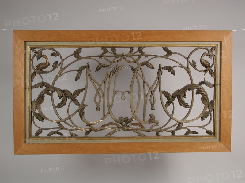 Top light with cut monogram amidst vines with leaves, in new frame, cutting window surface light wood carving sculpture visual