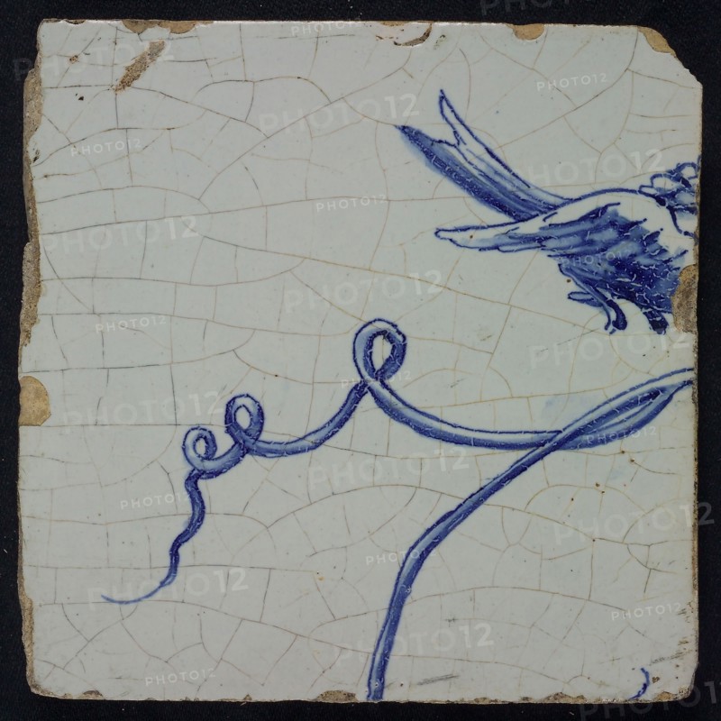 Blue tile with vine and bird in flight, of chimney pilaster with 39 tiles, tile pilaster footage fragment ceramic pottery glaze