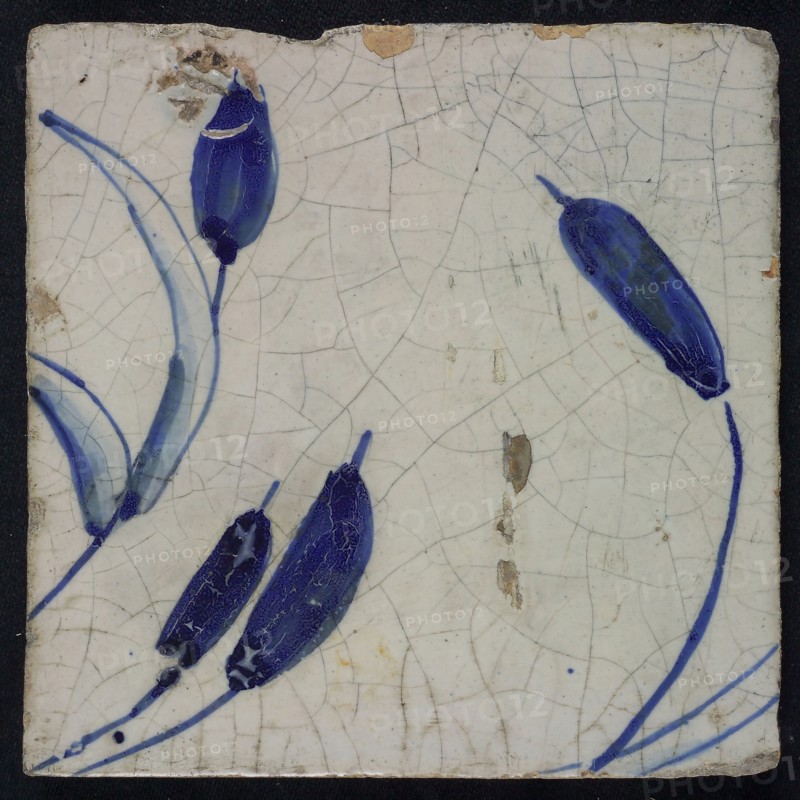Blue tile with variation on ears of corn, from chimney pilaster with 39 tiles, mating swans, ear of corn, leaf, butterfly
