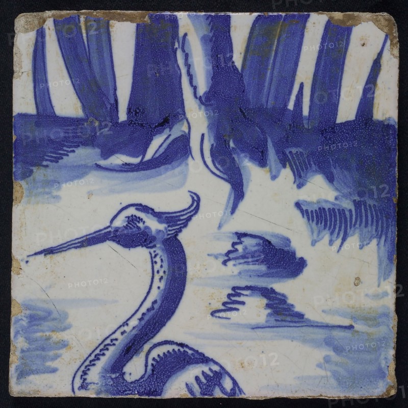 Blue tiles with grebe and petioles, possibly belonging to chimney pilaster with 13 tiles, tree of bunches of grapes with birds