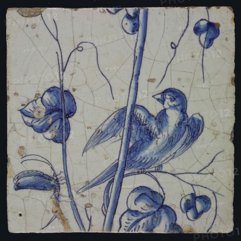 Blue tile with looking bird to dragonfly, on grape leaf of chimney pilaster with 13 tiles, tile pilaster footage fragment earth