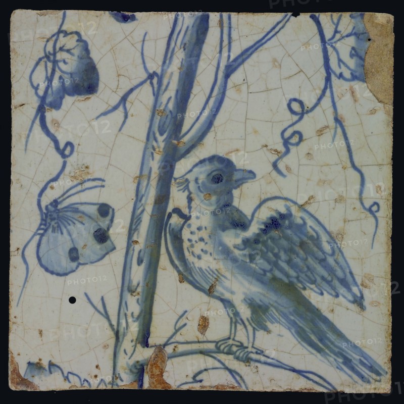 Blue tile with bird on grape leaf, butterfly, chimney pilaster with 13 tiles, tree of bunches of grapes with birds, grain