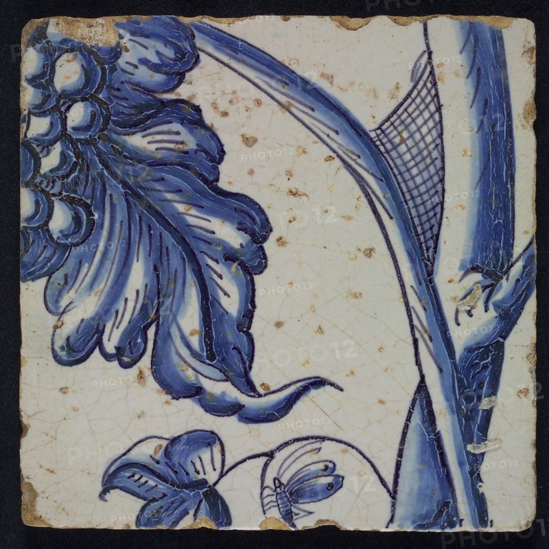 Blue tile of pilaster with 39 tiles, stems with spiderweb and piece of bunch of grapes, tile pilaster footage fragment ceramic