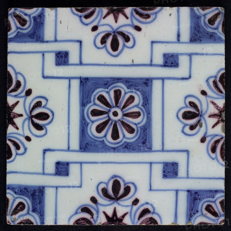 Ornament tile, blue on white, central square decor with purple rosette, along two blue diagonals diamond pattern, with flowers