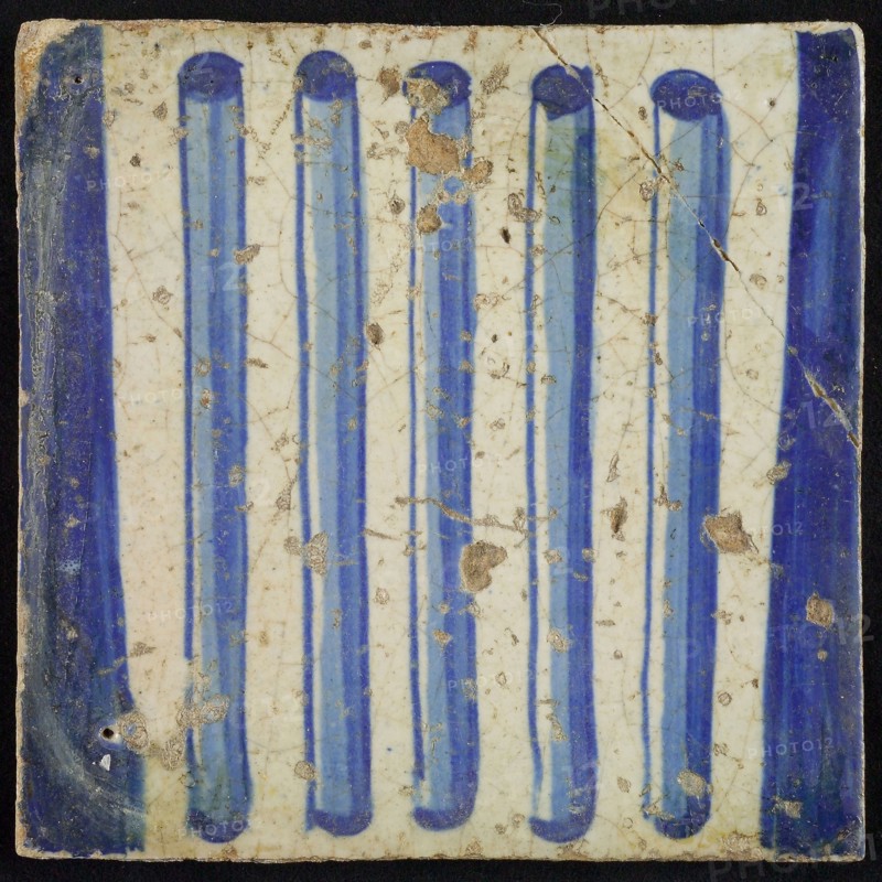 Tile of chimney pilaster, blue on white, part of pillar with cannelures, chimney pilaster tile pilaster footage fragment