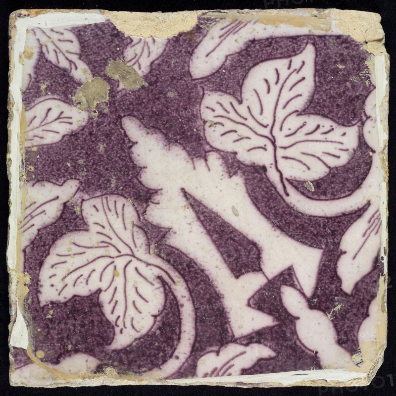 densely sprinkled purple ornament tile, open-worked stylized pointed leaves coming from corner, surrounded by creeper leaves