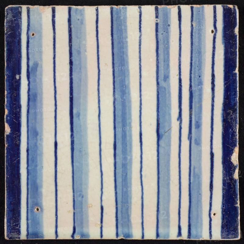 Tile of pilaster, blue on white, part of column with continuous flux, tile pilaster footage fragment ceramic pottery glaze
