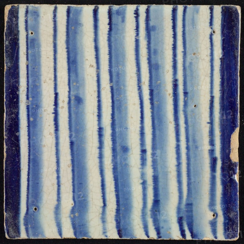 Tile of chimney pilaster, blue on white, part of column with continuous fluke, chimney pilaster tile pellet image fragment