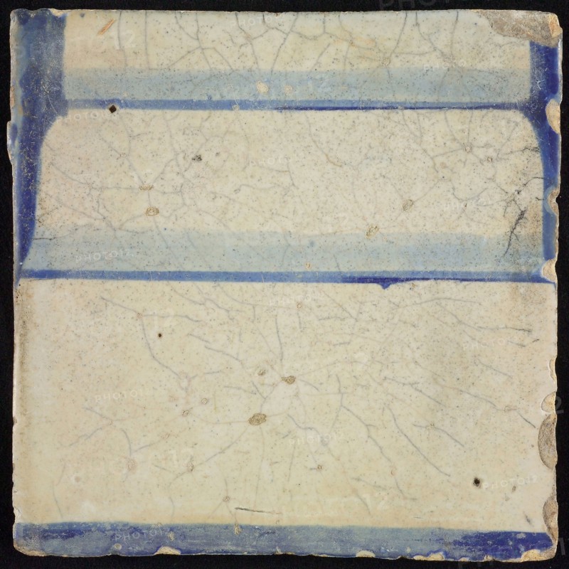 Tile of chimney pilaster, blue on white, part of column with foot, chimney pilaster tile pilaster footage fragment ceramics