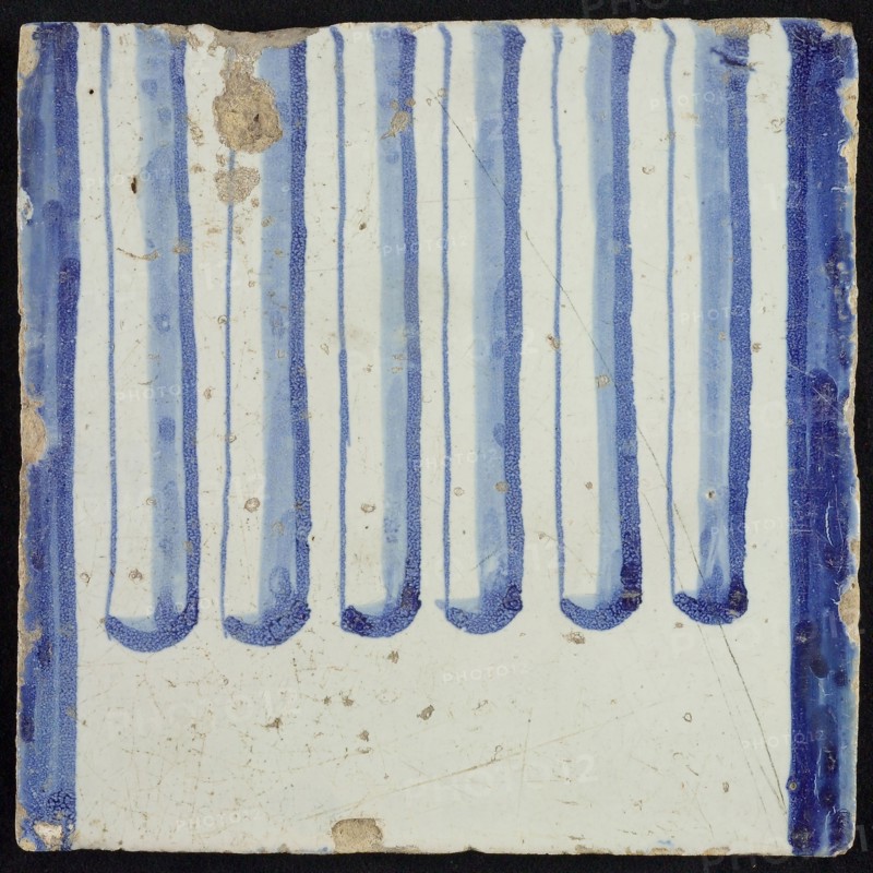 Tile of chimney pilaster, blue on white, part of column with cannelure, chimney pilaster tile pilaster footage fragment ceramic