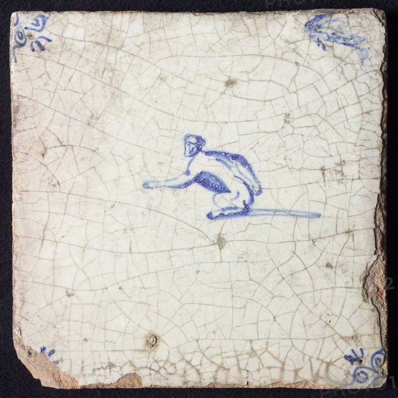 Animal tile, sitting monkey to the left, in blue on white, corner motif ox's head, wall tile tile sculpture ceramic earthenware