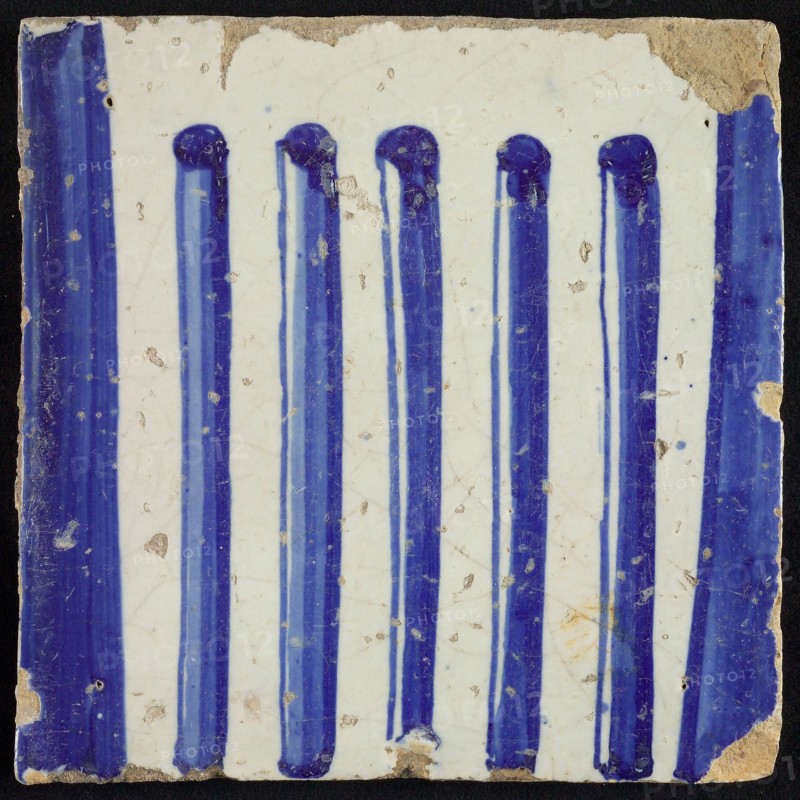Tile of chimney pilaster, blue on white, part of column with cannelure, chimney pilaster tile pilaster footage fragment ceramic