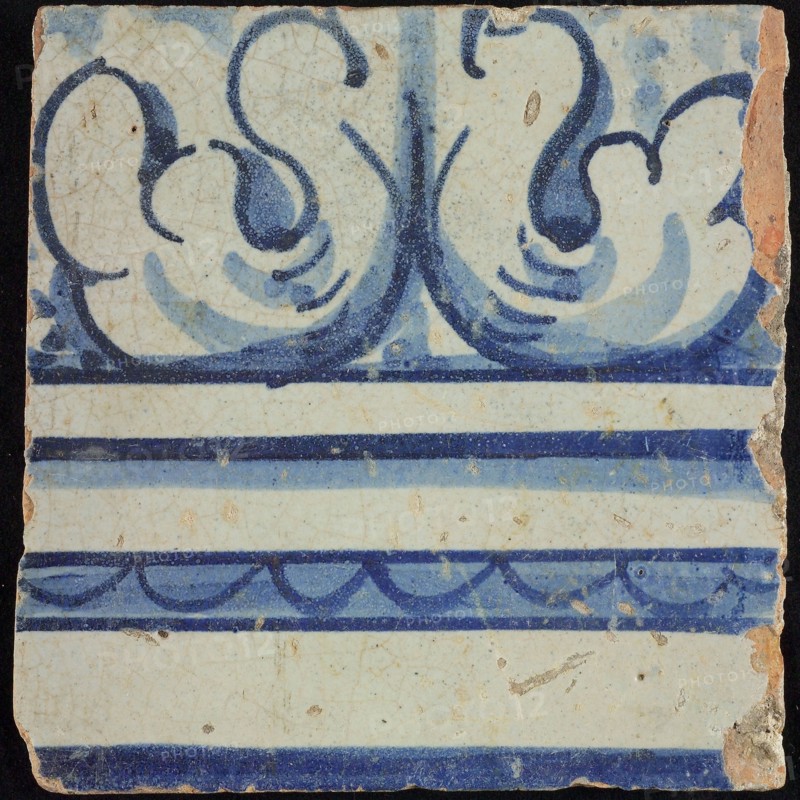 Tile of chimney pilaster, blue on white, part of column with capital on which curly ornament, chimney pilaster tile pilaster